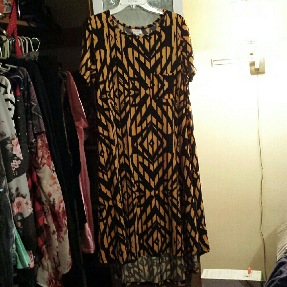 Never worn black and yellow LuLaRoe Carly